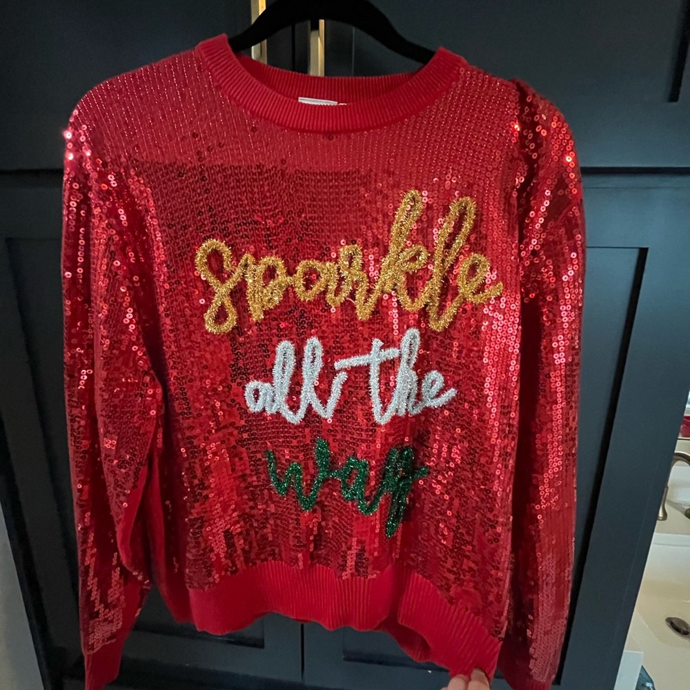 ‘Sparkle All The Way’ Queen of Sparkles sequin sweater.
